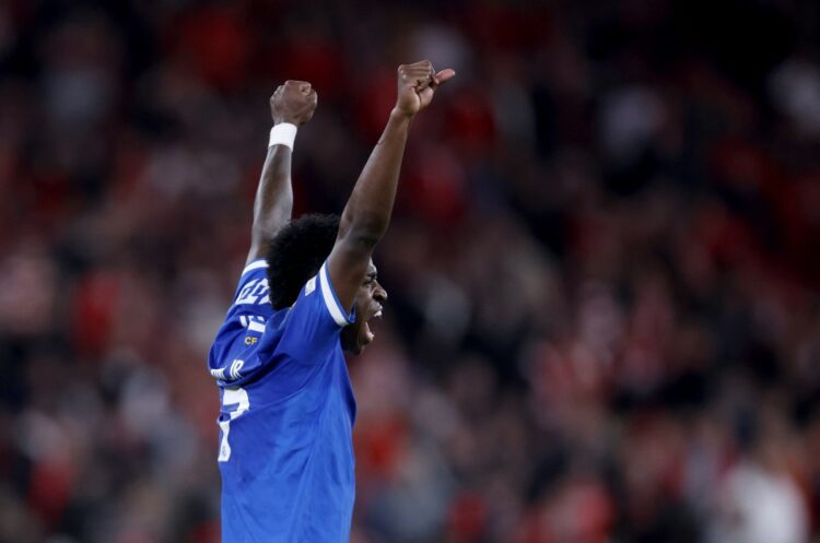 Real Madrid's Brazilian forward #07 Vinicius Junior celebrates victory at the end of the UEFA Champions League knockout round play-off first leg football match between SL Benfica and Real Madrid CF at Estadio da Luz in Lisbon on February 17, 2026. Real Madrid won 0-1. (Photo by FILIPE AMORIM / AFP)