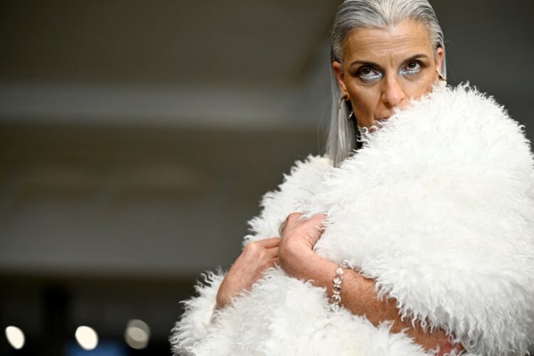 A model presents a creation for Weinsanto for the Women's Ready to Wear Fall/Winter 2026-2027 collection fashion show as part of the Paris Women Fashion Week, in Paris, on March 2, 2026. (Photo by JULIEN DE ROSA / AFP)